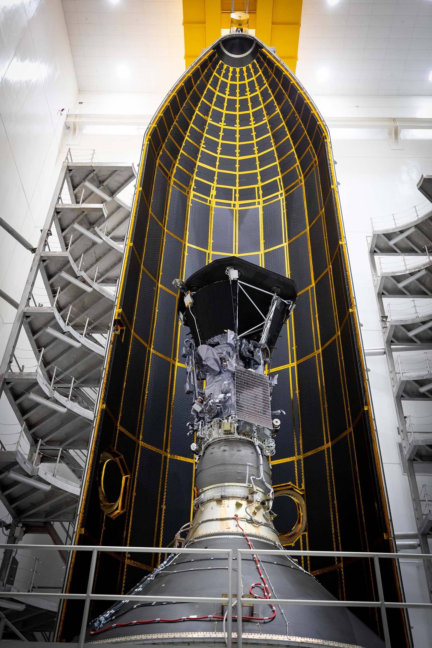 Seen here inside one half of its 62.7-foot-tall fairing, NASA’s Parker Solar Probe was encapsulated on July 16, 2018
