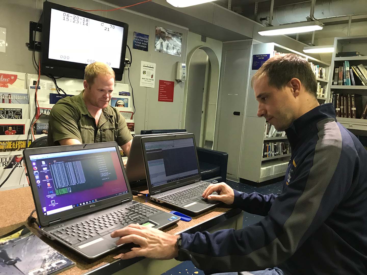 From left: Ryan Mennecke and Edward Holzinger aboard the USS Carl Vinson during Trident Warrior 2018