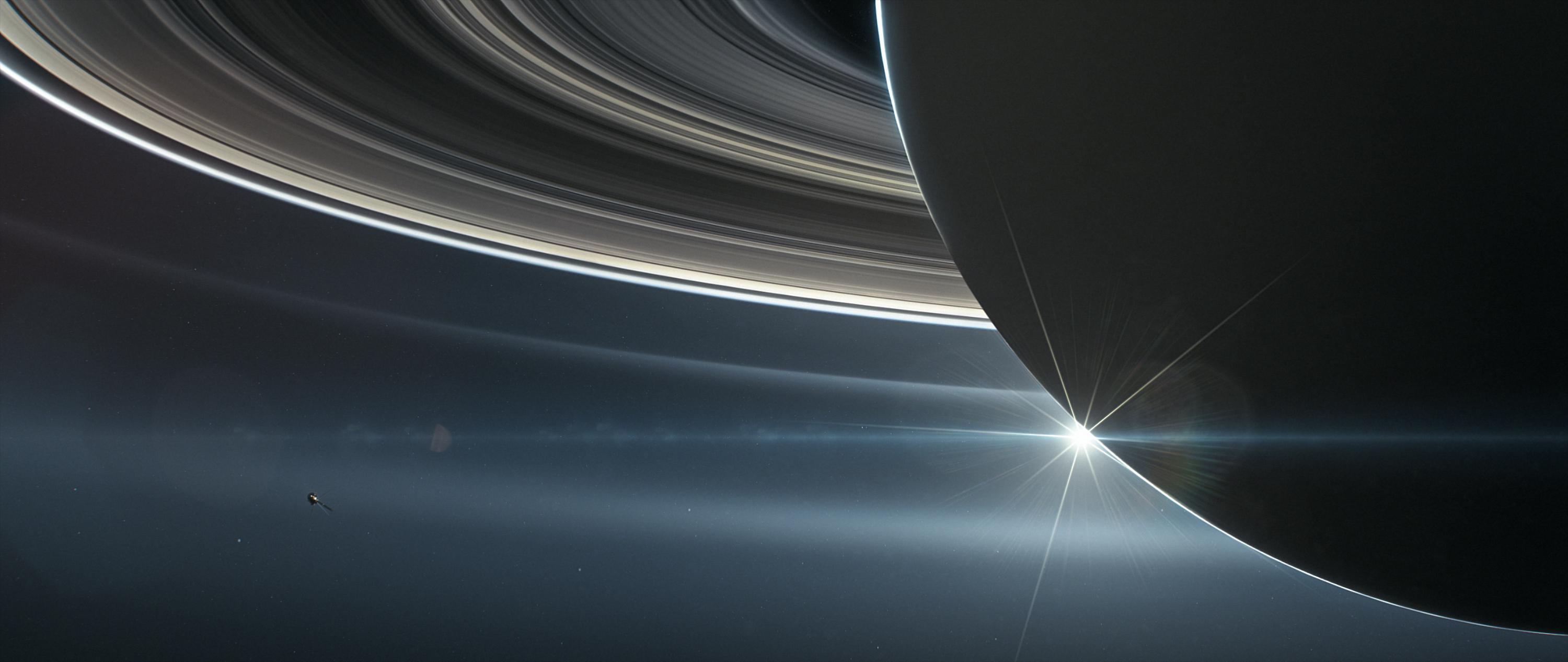 This illustration shows NASA’s Cassini spacecraft in orbit around Saturn.