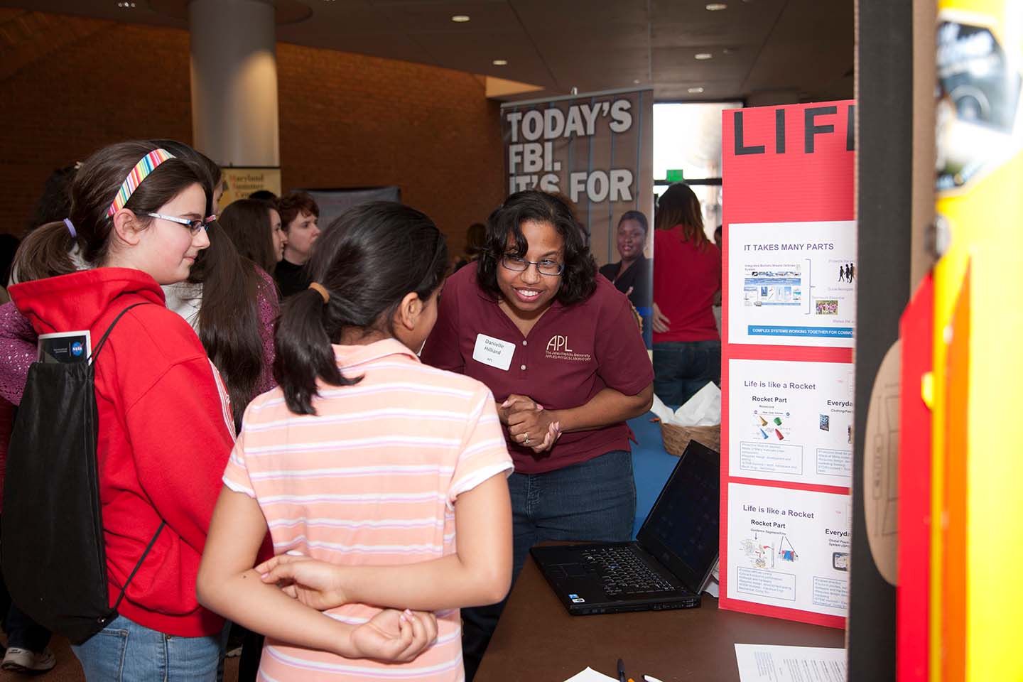 APL's Danielle Hilliard talks about her career as a rocket scientist with students attending last year's Girl Power event.
