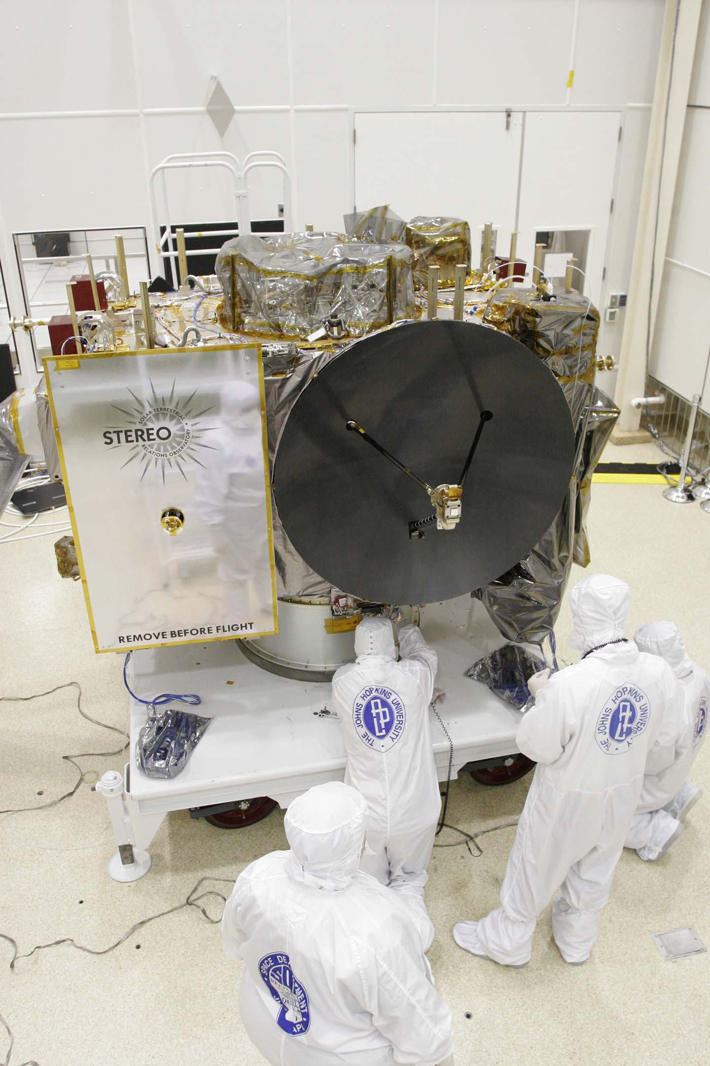 APL technicians and engineers prepare one of the twin STEREO spacecraft for shipment
