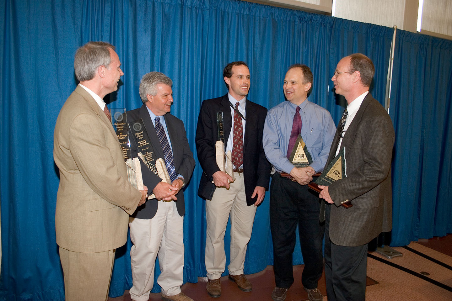 Applied Physics Laboratory researchers (from left) Jerry Krill, Henry Kues, Eric Van Gieson, Bradley Boone and Matthew Bevan