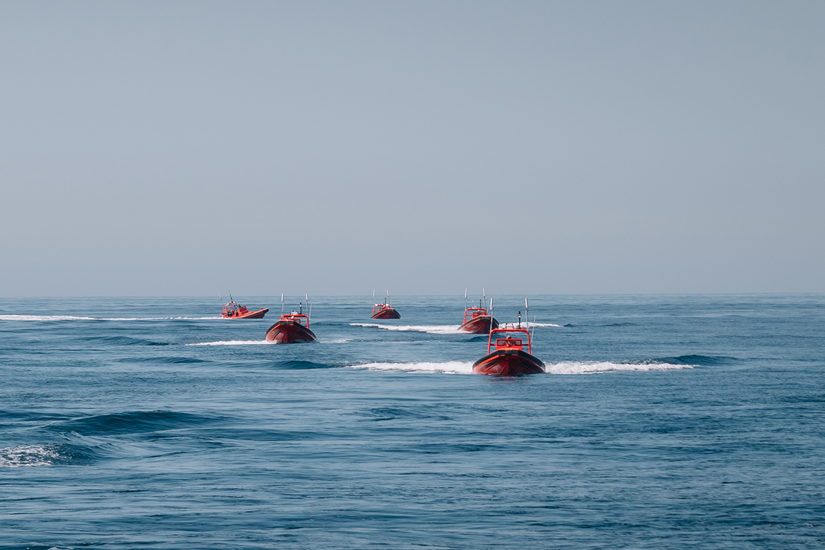 Autonomous swarming unmanned surface vessels (SUSVs) — equipped with Johns Hopkins APL-developed hardware and autonomy software