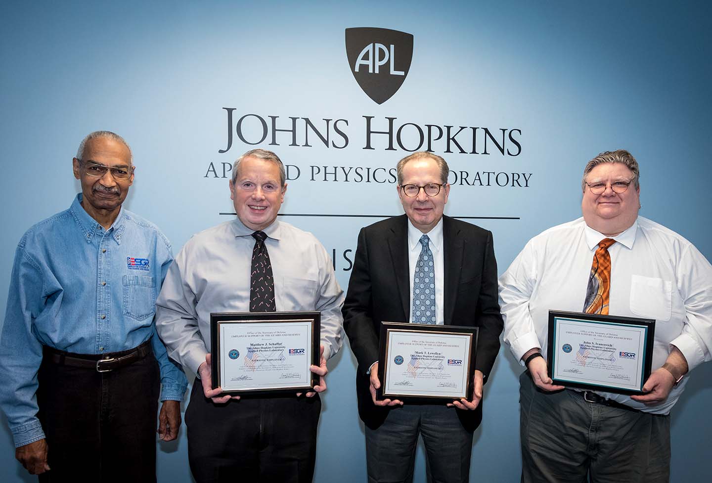 ESGR Maryland vice chair Samuel Peebles (left) with APL award winners Matthew Schaffer, Department Head Mark Llewelyn, and John Ivancovich