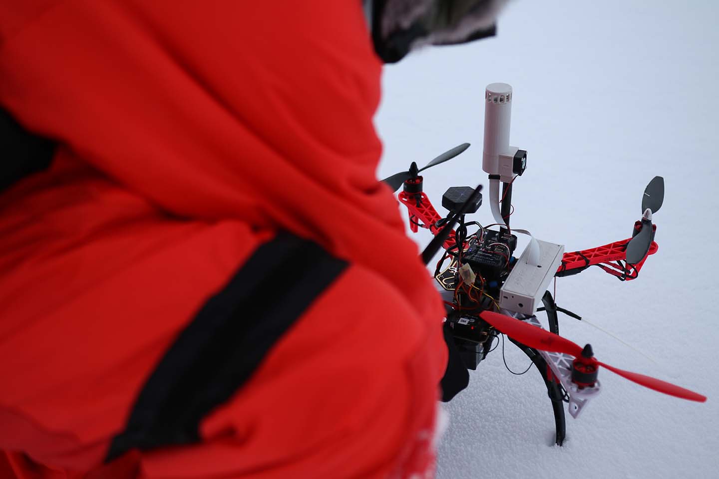 Burchfield works with a Met UAS in the Arctic.