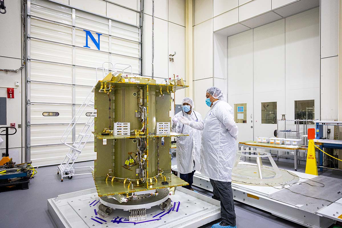 Jeremy John, DART’s lead propulsion engineer, standing here (at right) with Juan Morales.