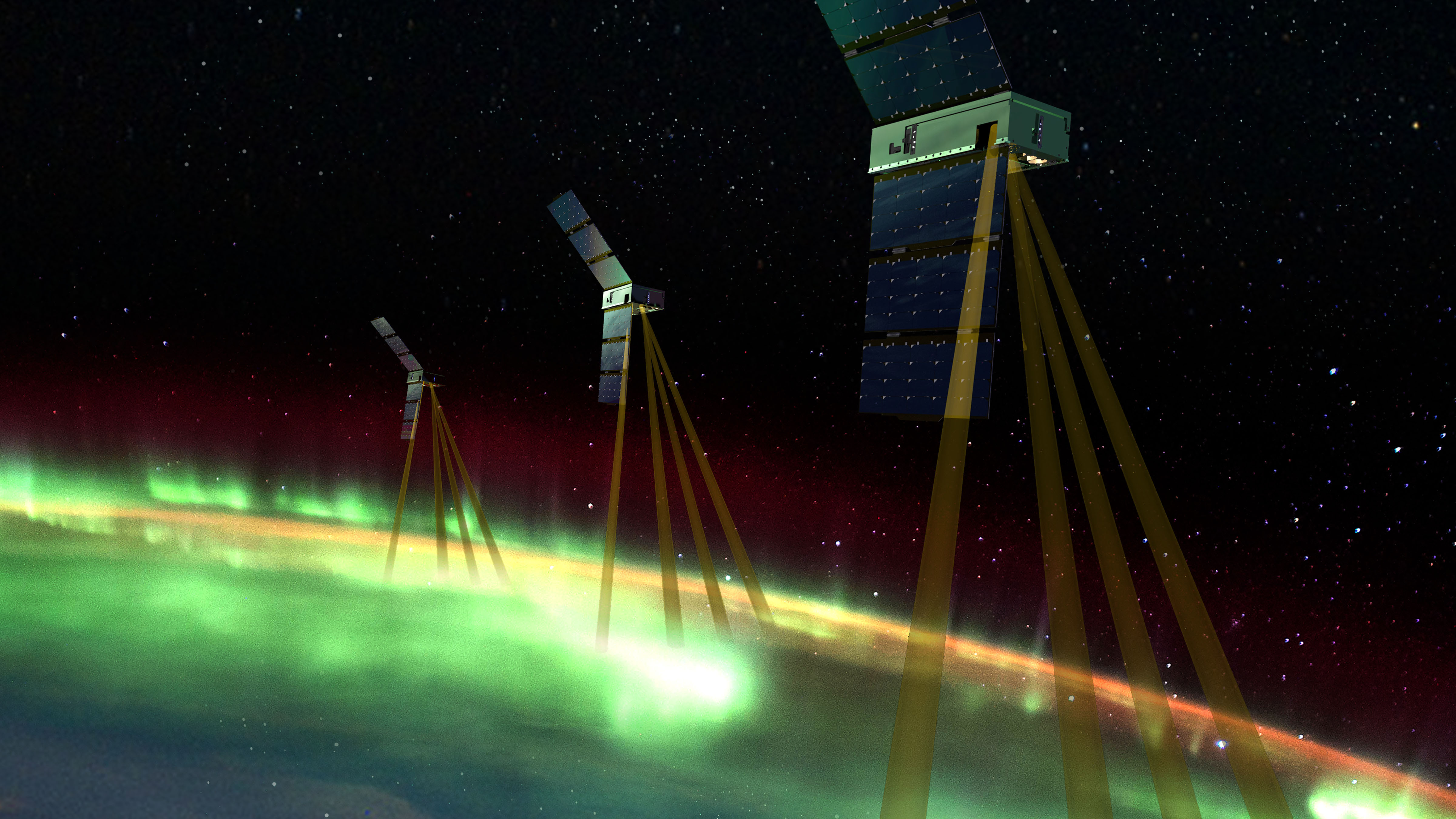 Artist’s conception of the Johns Hopkins APL-led Electrojet Zeeman Imaging Explorer (EZIE) NASA mission. EZIE consists of three SmallSats that will study the auroral electrojet, which are electrical currents flowing about 60 to 90 miles above the poles that link the beautiful aurora to the Earth’s magnetosphere, and which responds to solar activity and other drivers. This space weather mission is scheduled to launch in 2024.  Credit: NASA/Johns Hopkins APL