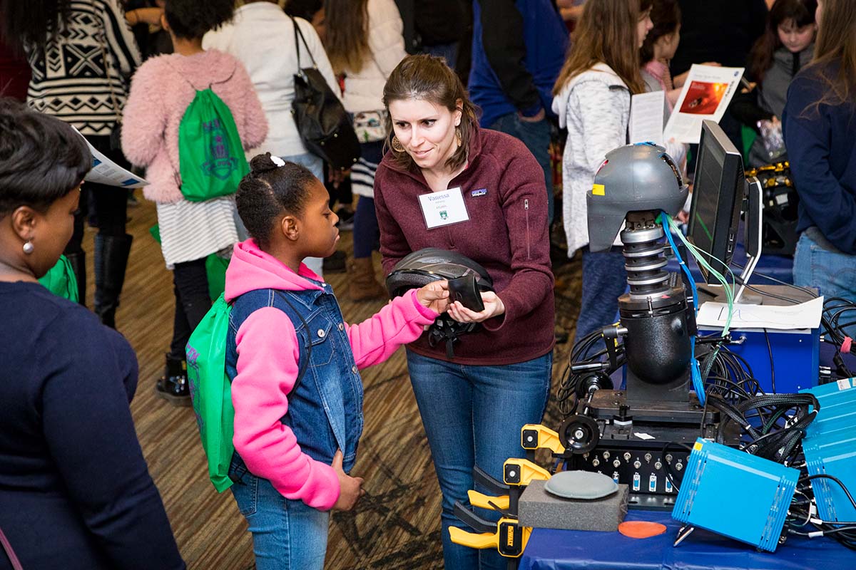 A Girl Power 2018 in-person attendee participates in a biomechanics demonstration