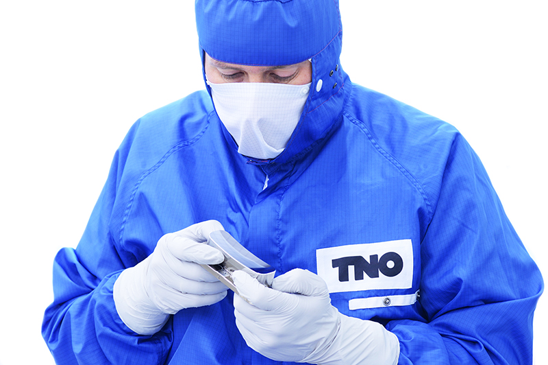 A TNO staff member inspects one of the freeform mirrors of the Sentinel-5P instrument, launched in 2017. Freeform optics is an innovative manufacturing method that designs lenses and mirrors so they can bend light in ways traditional geometries cannot. TNO will be contributing freeform optics for CHAPS, a groundbreaking instrument that will monitor pollutants in the atmosphere at an unparalleled scale.  Credit: TNO