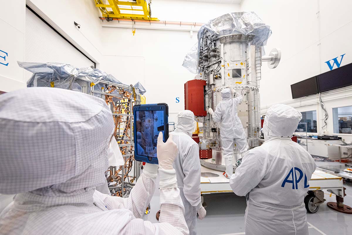 Mihaela Ballarotto samples Europa Clipper’s propulsion module for planetary protection cleanliness prior to harness installation.