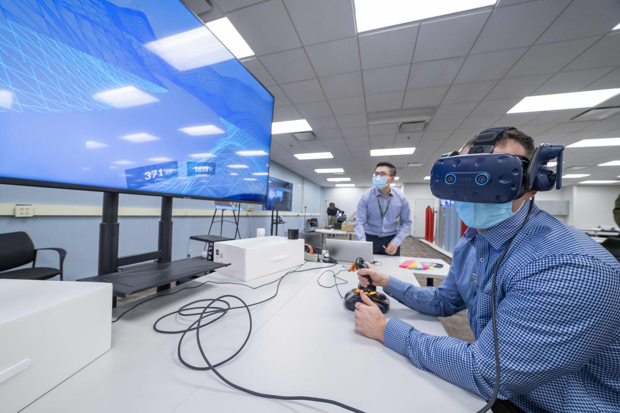 Lt. Col. Alan Clarke immerses himself in one of the team’s virtual reality prototypes