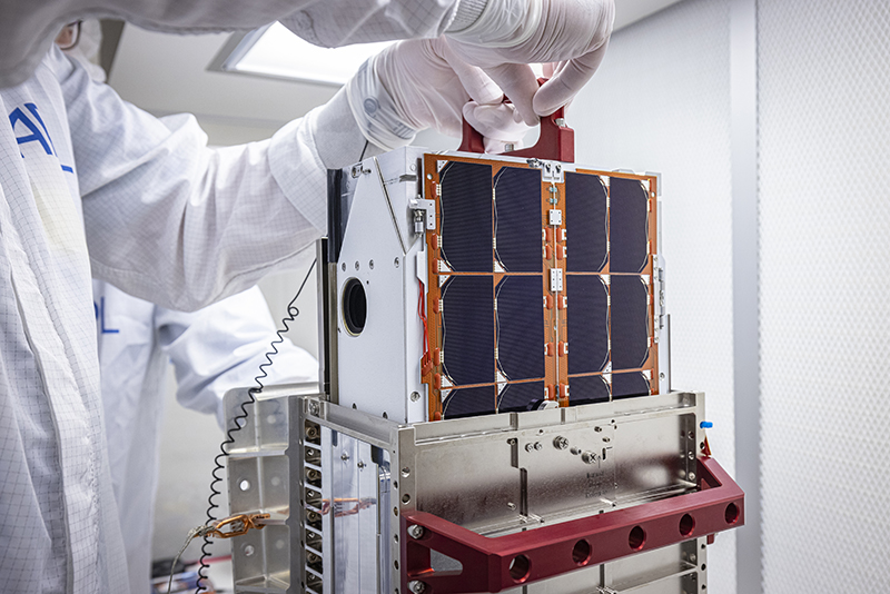 ART team engineers lift and inspect the LICIACube CubeSat after it arrived at Johns Hopkins APL in August.