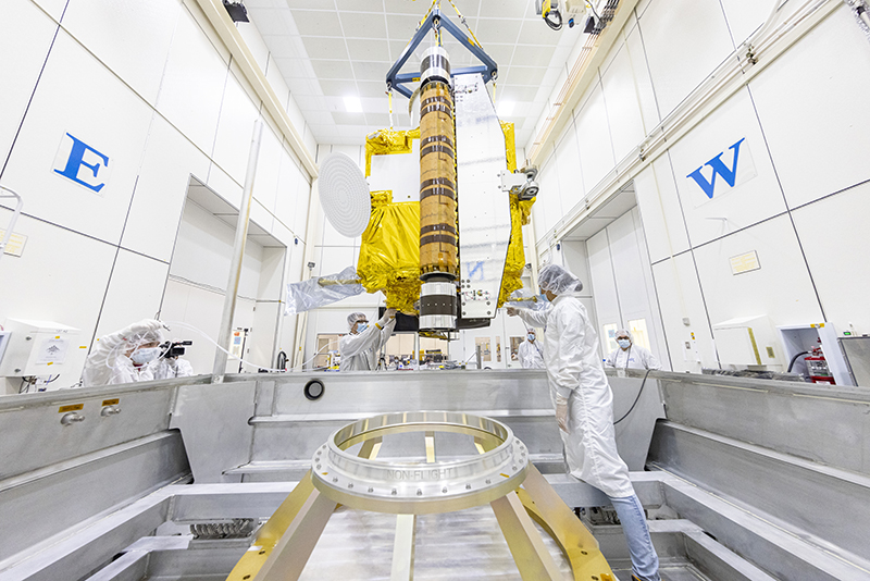 Inside a clean room at Johns Hopkins APL, the DART spacecraft was moved into a specialized shipping container that headed across the country to Vandenberg Space Force Base near Lompoc, California, where DART is scheduled to launch from late next month.  Credit: Johns Hopkins APL/Ed Whitman