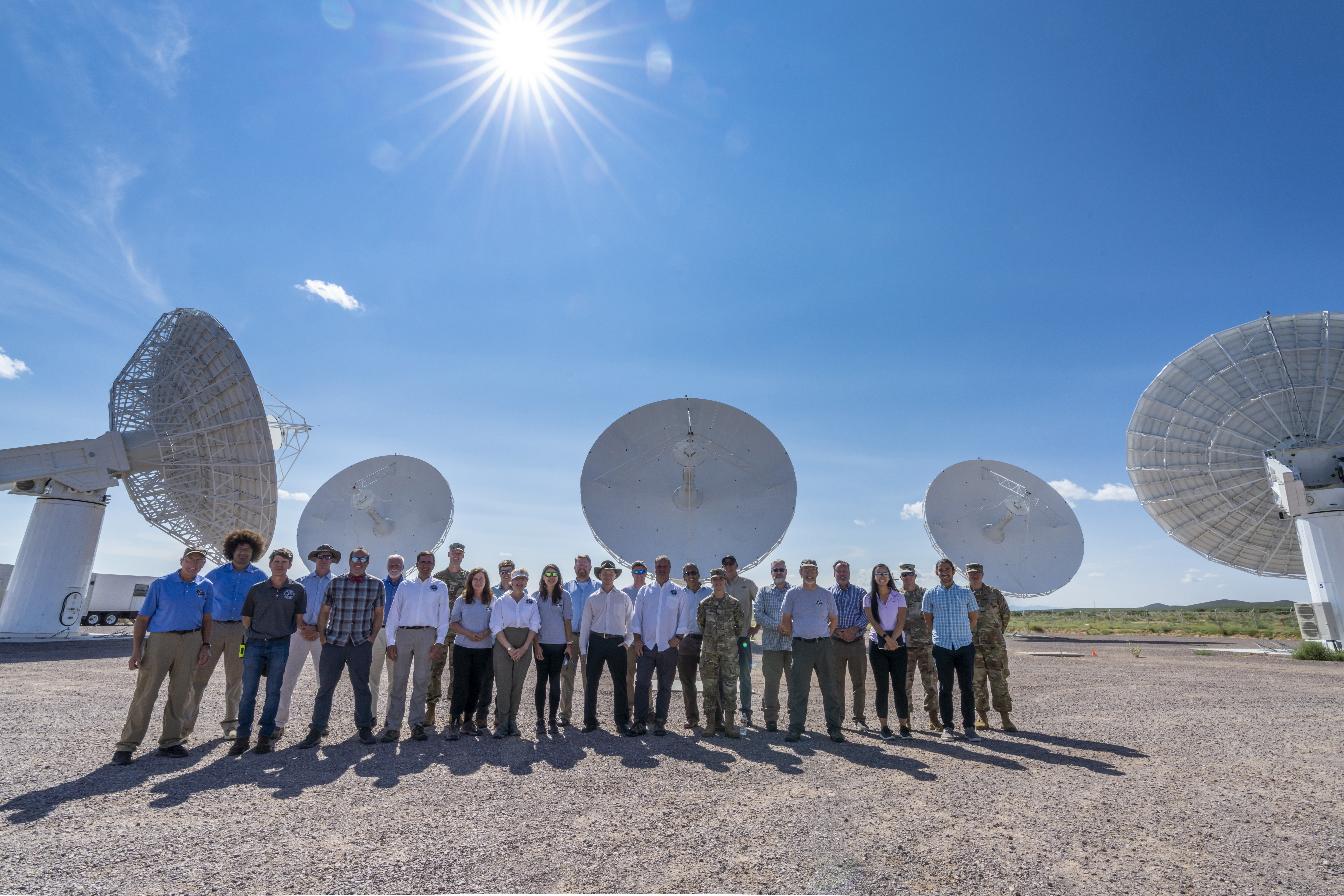 Engineers from Johns Hopkins APL in Laurel, Maryland, and their industry and government partners stand proudly in front of the Deep Space Advanced Radar Concept (DARC) in White Sands Missile Range, New Mexico