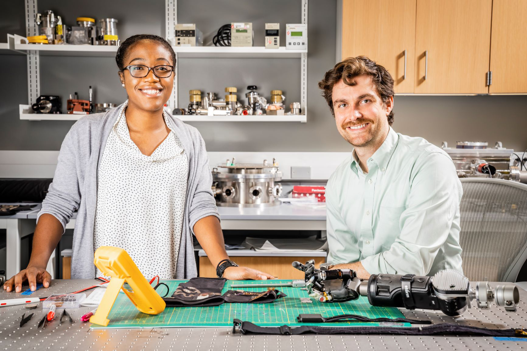 Korine Ohiri (left) and Luke Osborn lead a project team aiming to embed multilayered tactile sensors to enhance robotic systems.