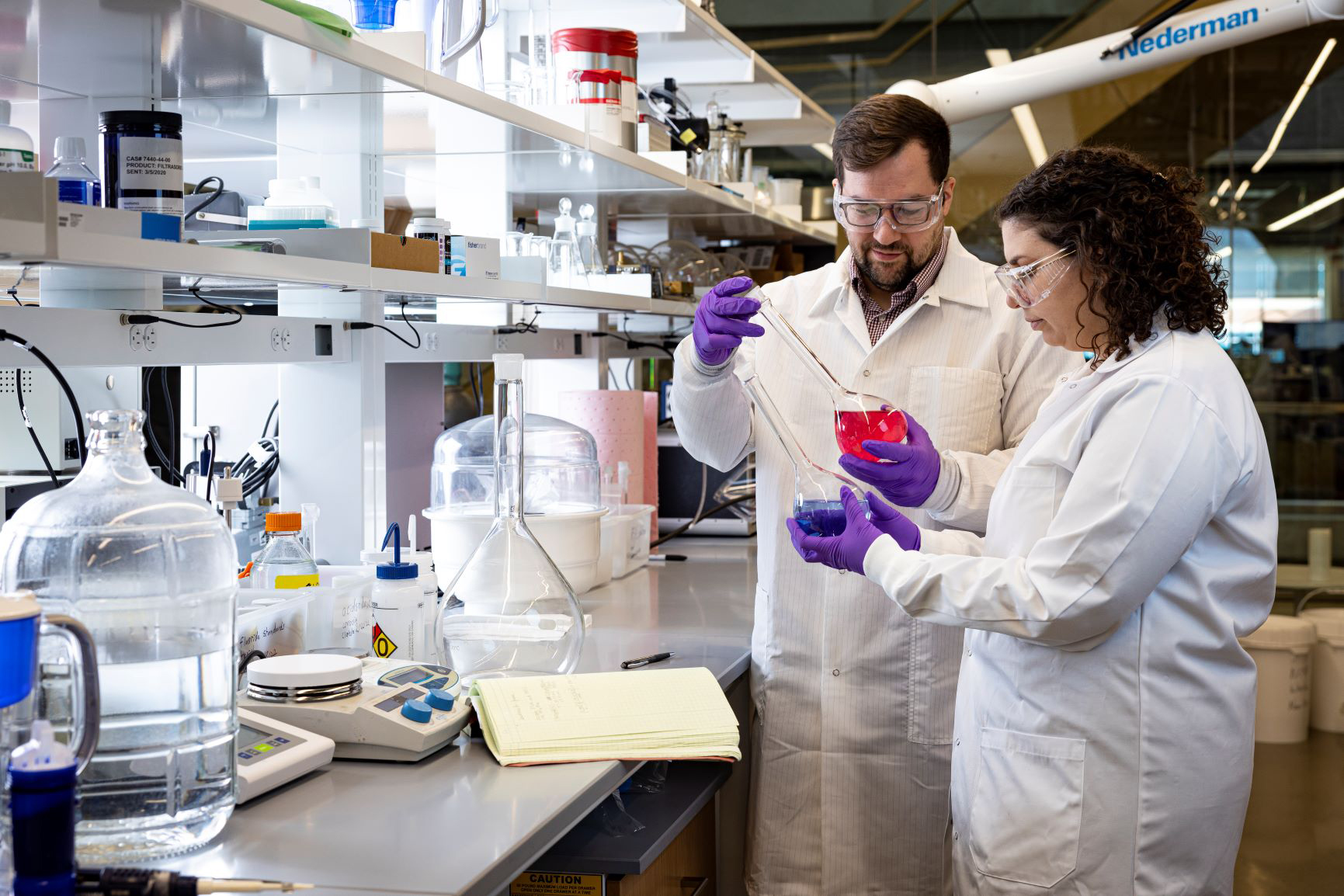 James Johnson and Danielle Nachman in APL’s PFAS research laboratory.