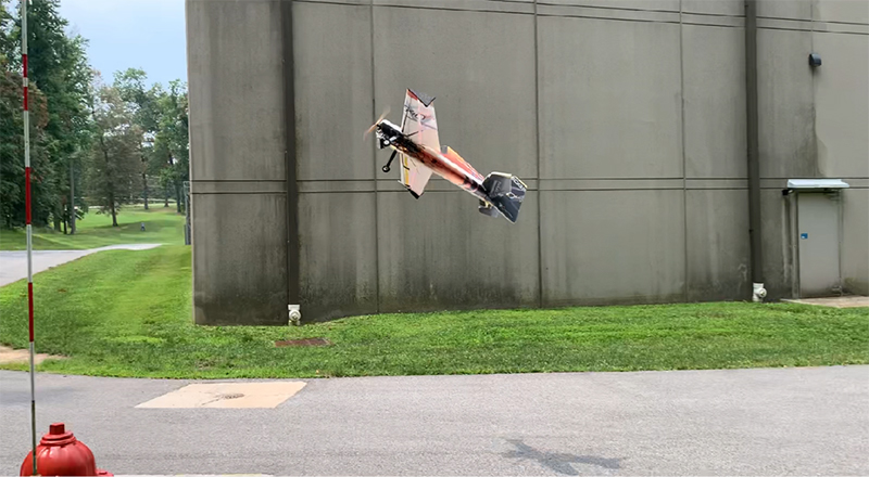 A fixed-wing UAV completes a maneuver during testing at APL.