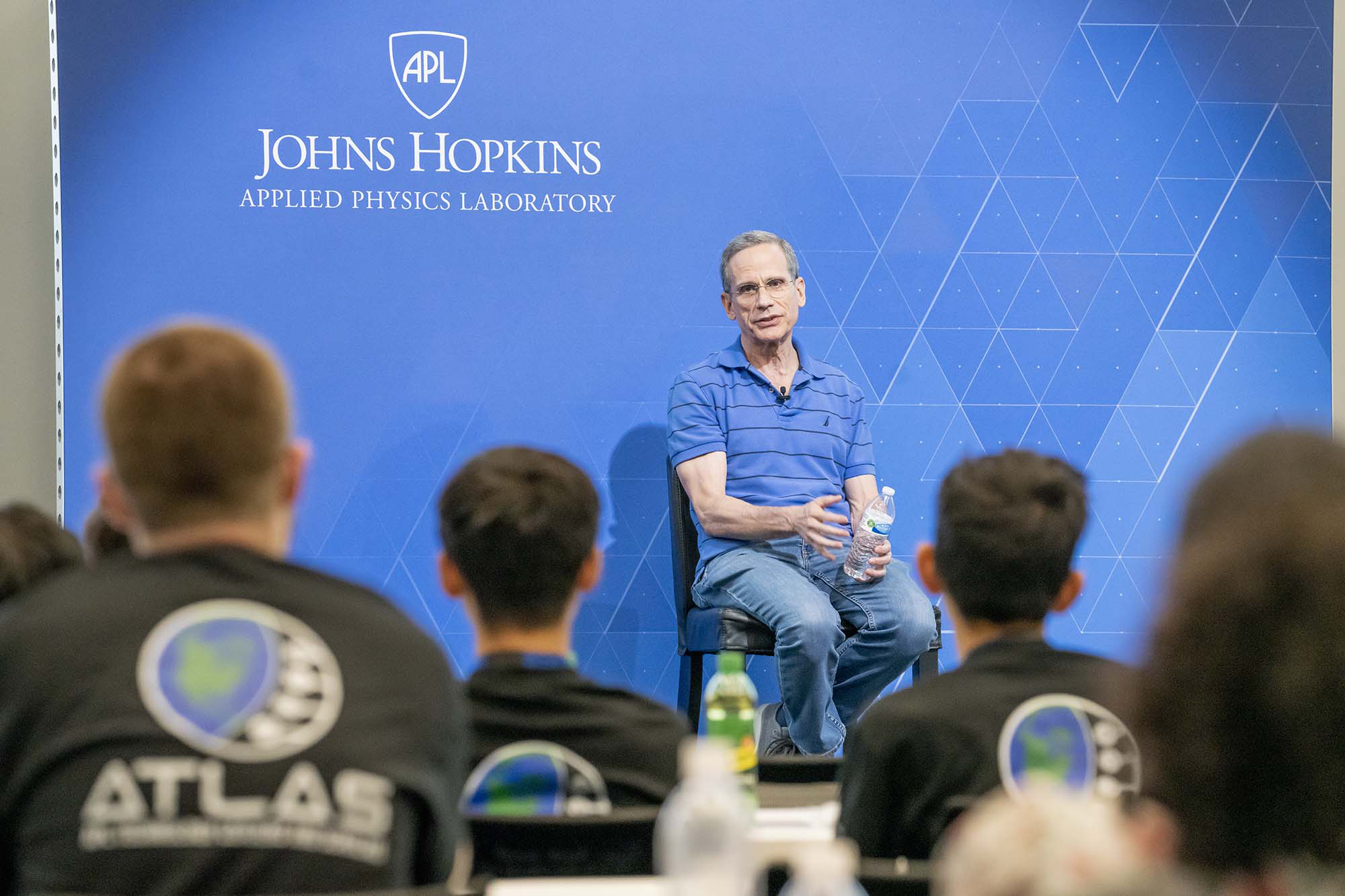 Lab Director Ralph Semmel speaks to ATLAS interns at a town hall last summer.