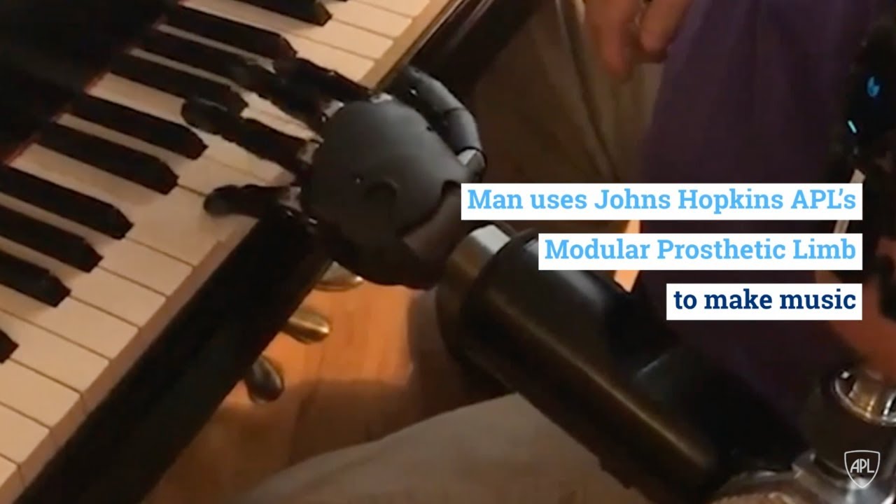 Man uses Johns Hopkins APL's Modular Prosthetic Limb to make music