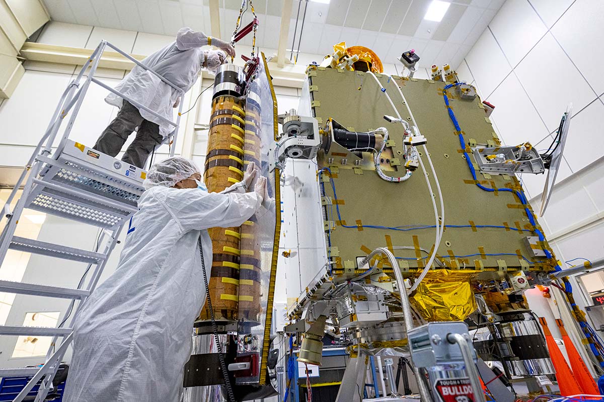APL engineers work on components for the DART spacecraft