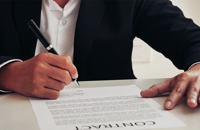 Person signing contract