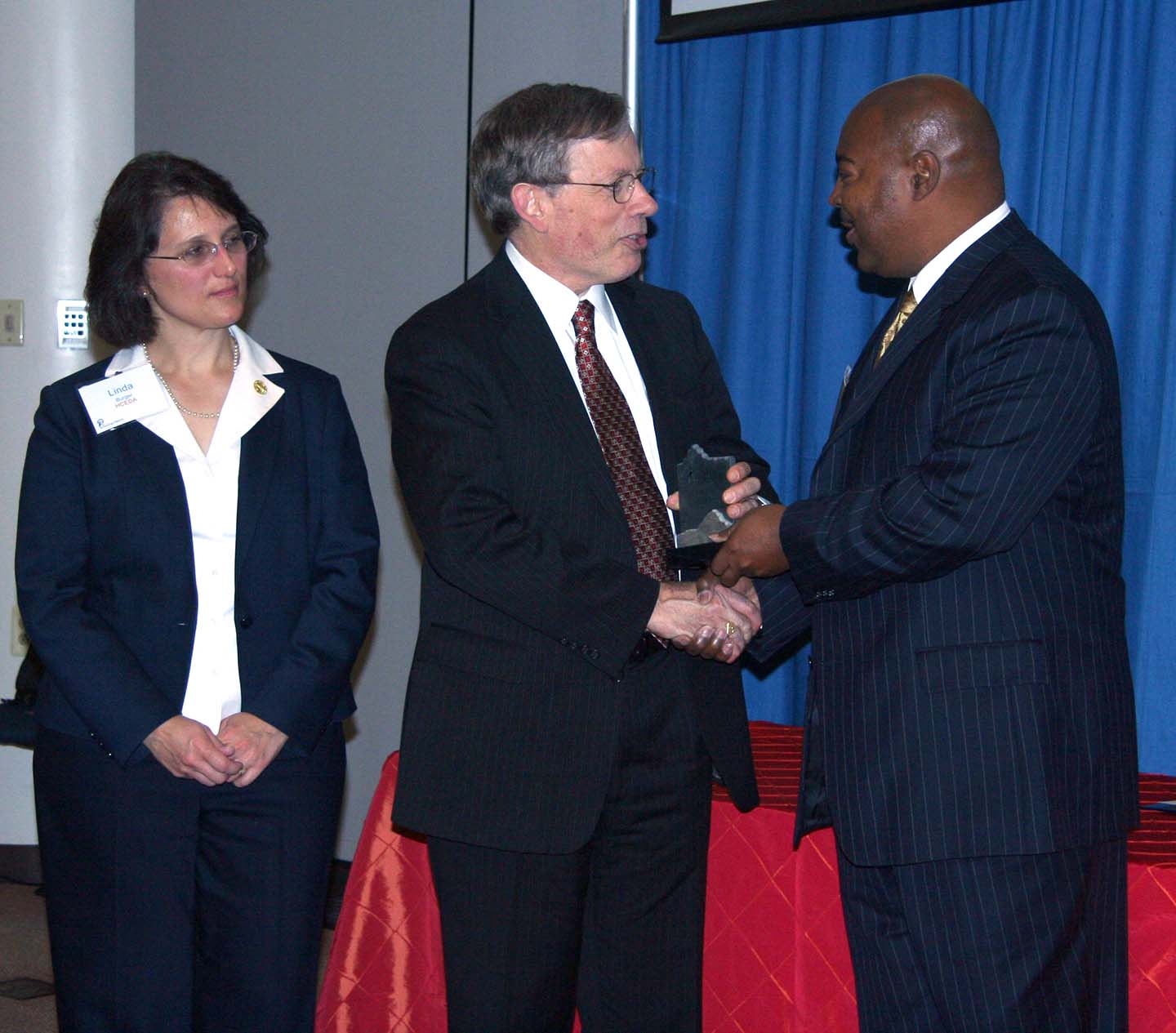 From left: Linda Burger, Rich Roca, Larry Collins