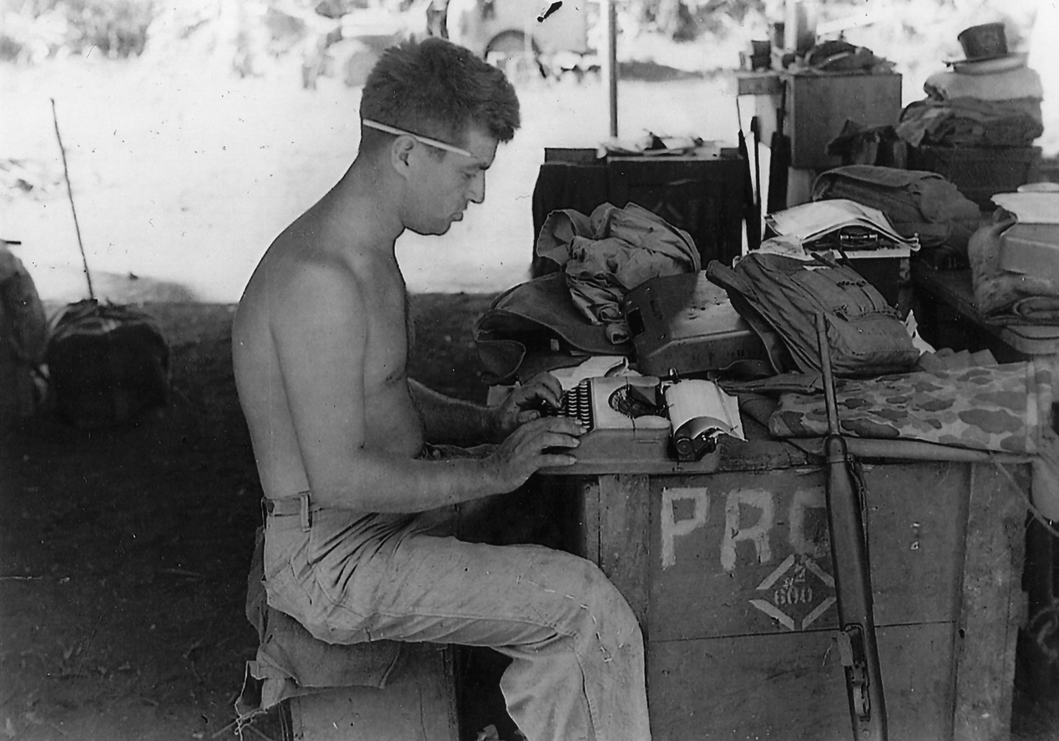 In this 1944 photo, Cyril 'Cy' O'Brien, a former Marine combat correspondent, uses a typewriter on Guam.