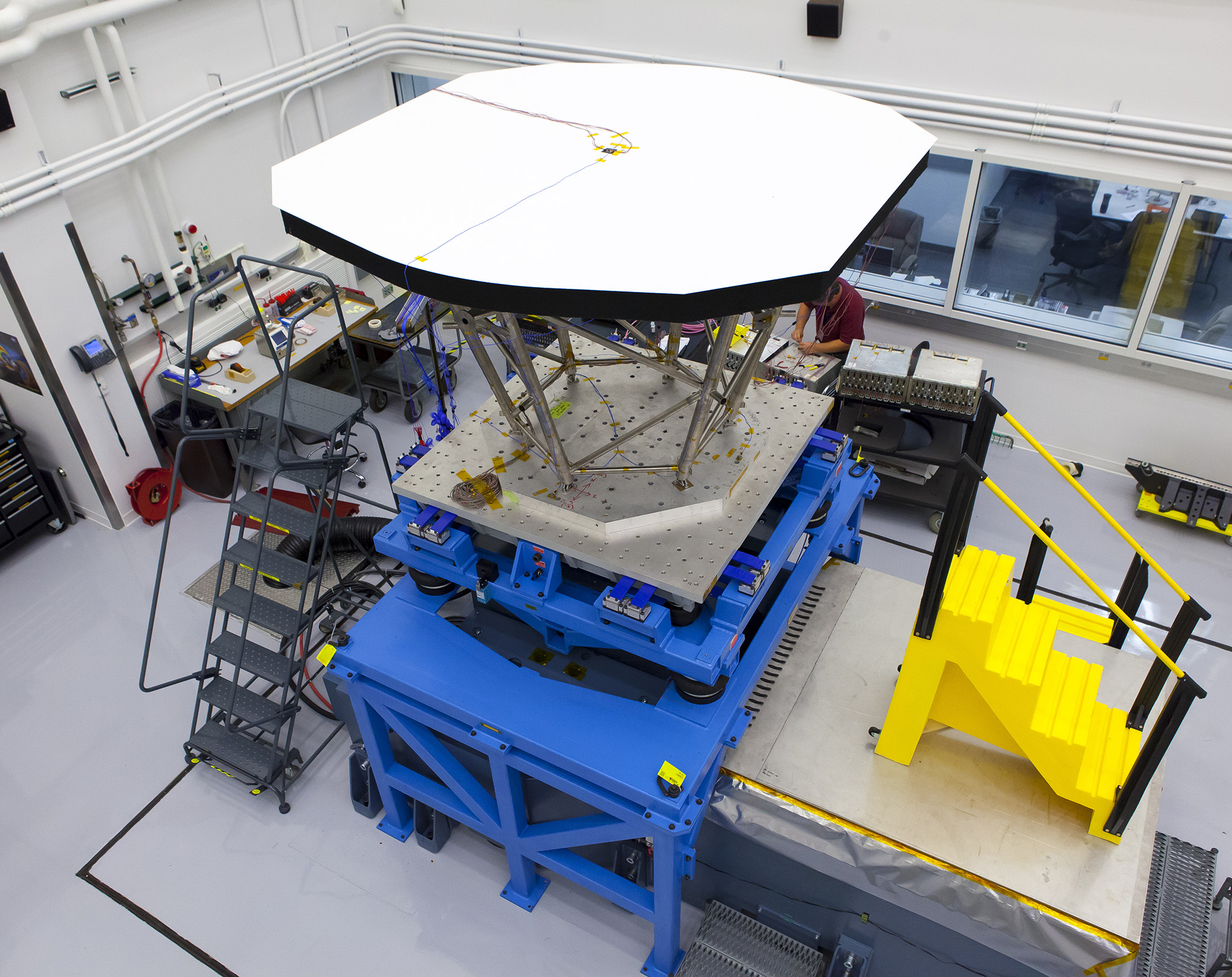 Technicians at the Johns Hopkins University Applied Physics Laboratory in Laurel, Md., prepare an engineering model of the Solar Probe Plus Thermal Protection System