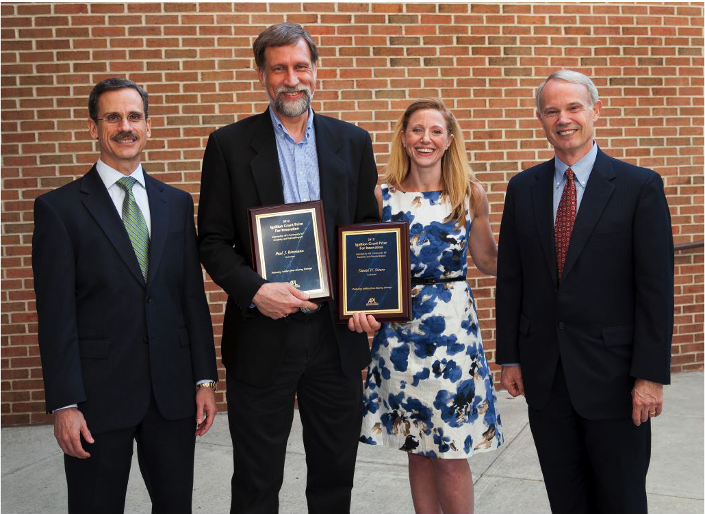 Pictured left to right: APL Director Ralph Semmel, Paul Biermann, Courtney Samuels (Office of U.S. Senator Barbara Mikulski), APL Assistant Director for Science and Technology Jerry Krill