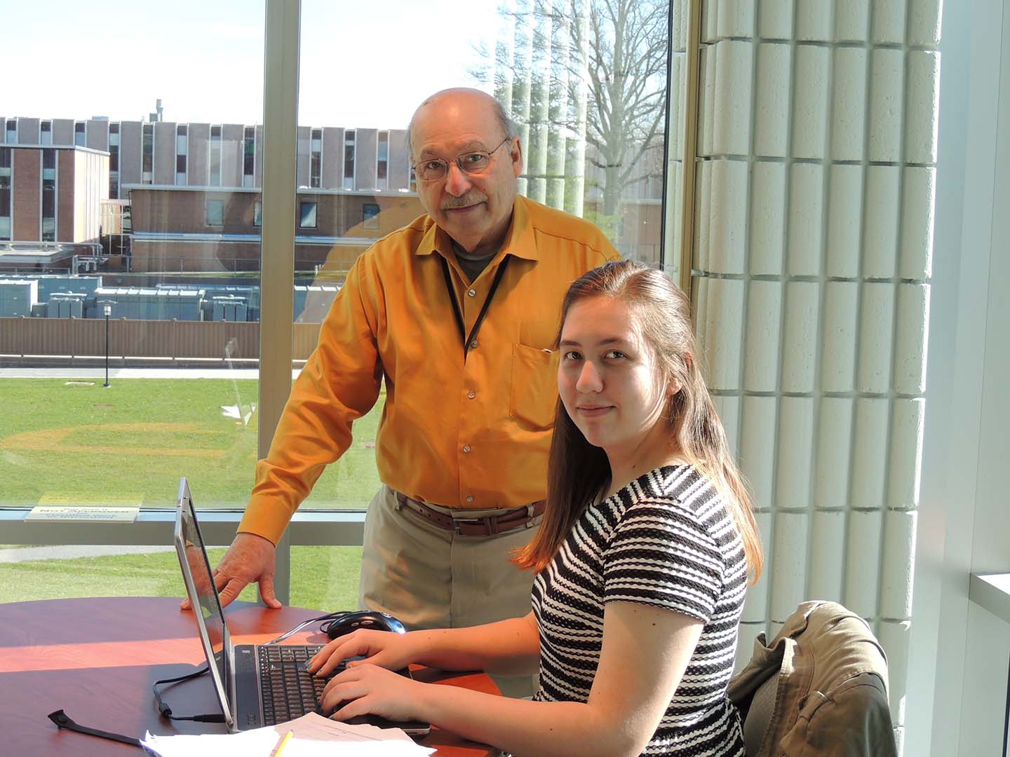 ASPIRE intern and Centennial High School Student Kelly White works with her mentor Mario Stalker of Johns Hopkins APL