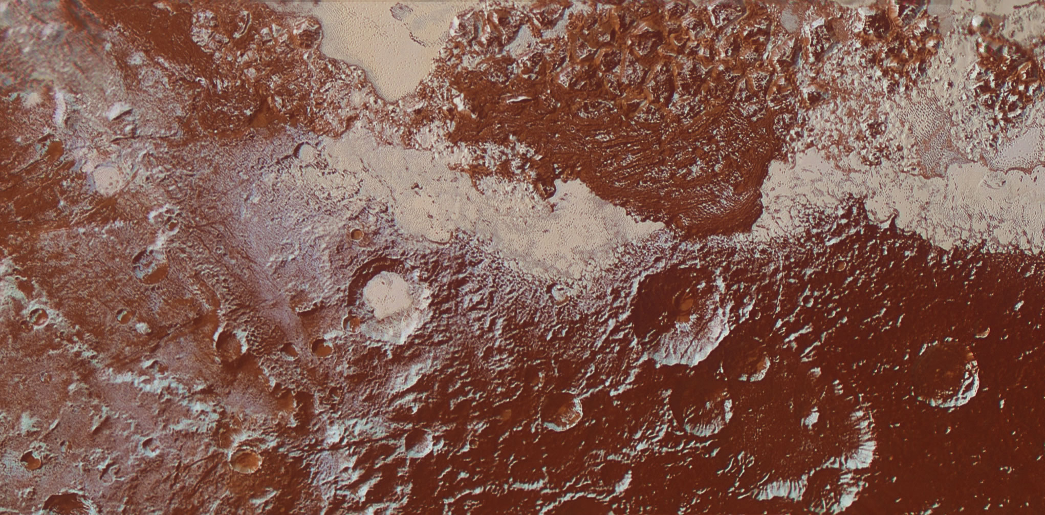 enhanced color view of Pluto’s surface diversity