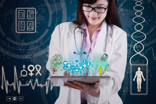 Doctor reviews health data on a tablet