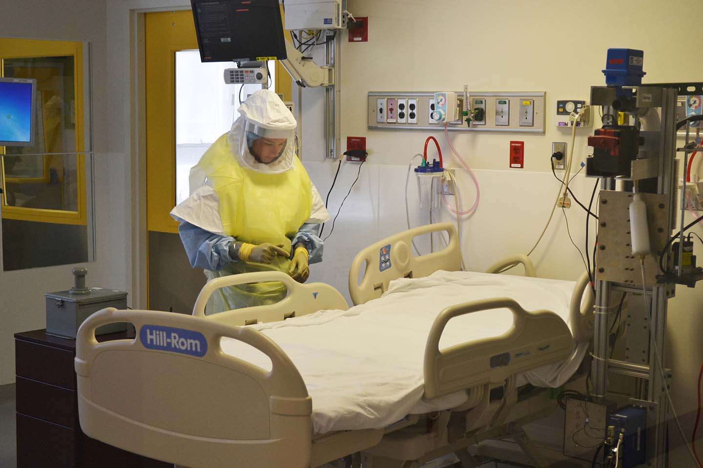 Nurse Mallory Reimers goes through the steps of caring for an infected patient