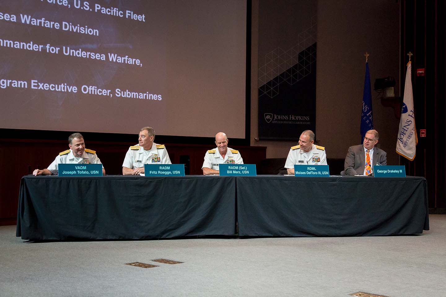 From left, Vice Adm. Joseph Tofalo, Rear Adm. Fritz Roegge, Rear Adm. (Sel) Bill Merz, Rear Adm. Moises Deltoro III, and George Drakeley III