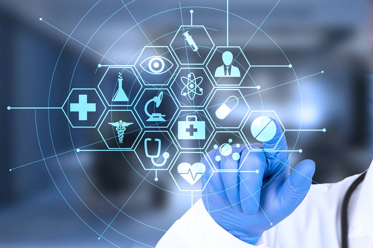 Doctor's hand points to a virtual screen (Credit: Bigstock)