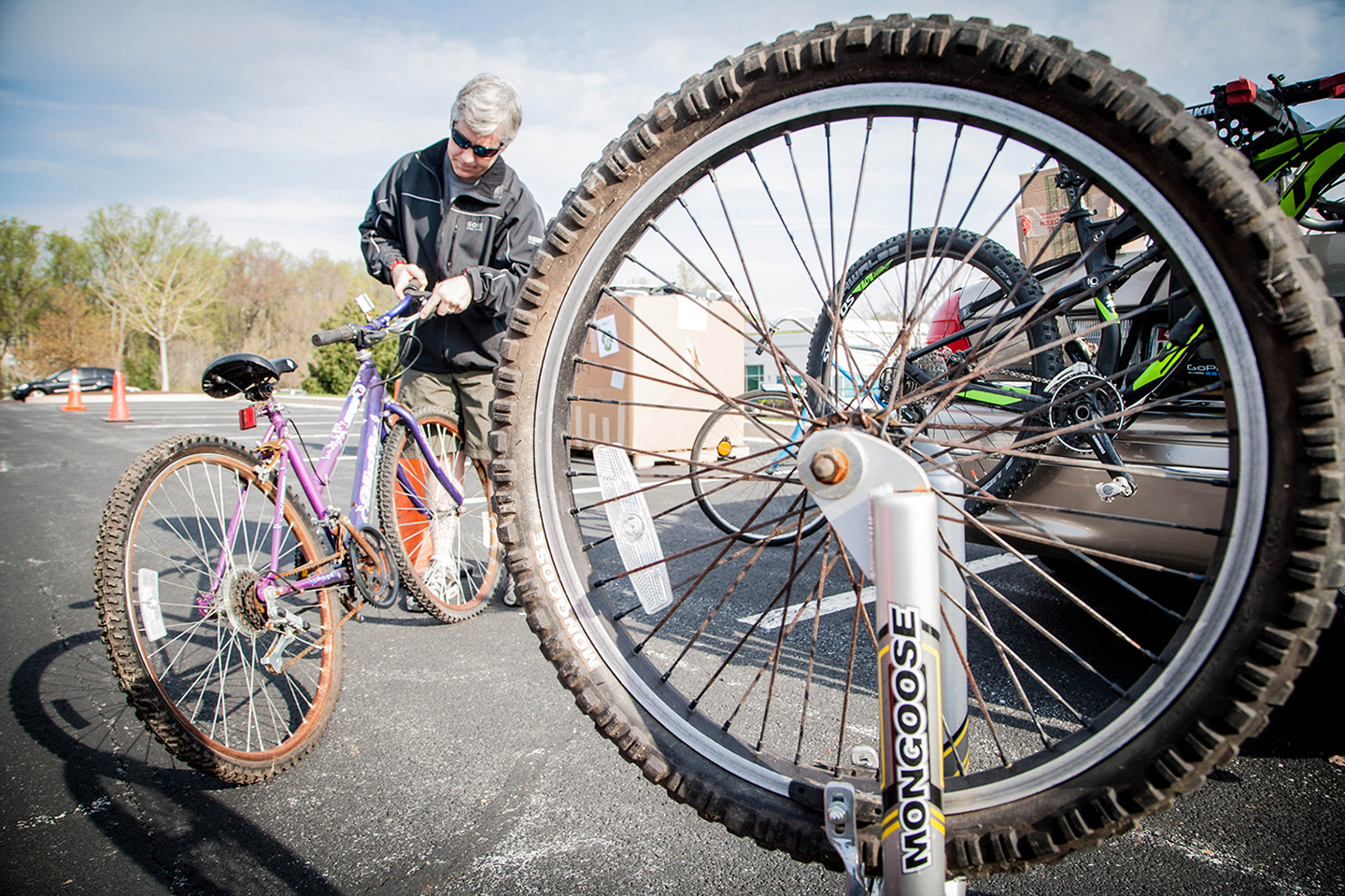 APL staff members donate bicycles and glasses to charity