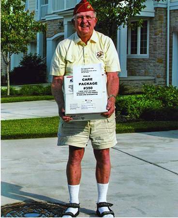 Donald Downer (ret. 1989) packs the 478th and 479th care packages to troops in Iraq and Afghanistan