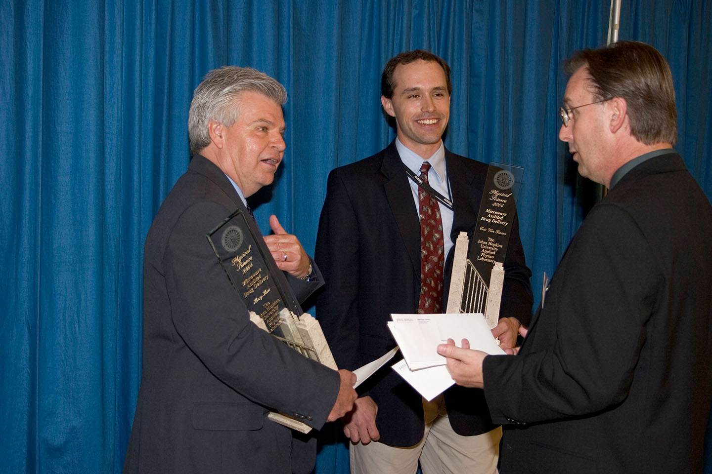 Henry Kues (left) and Eric Van Gieson (center)