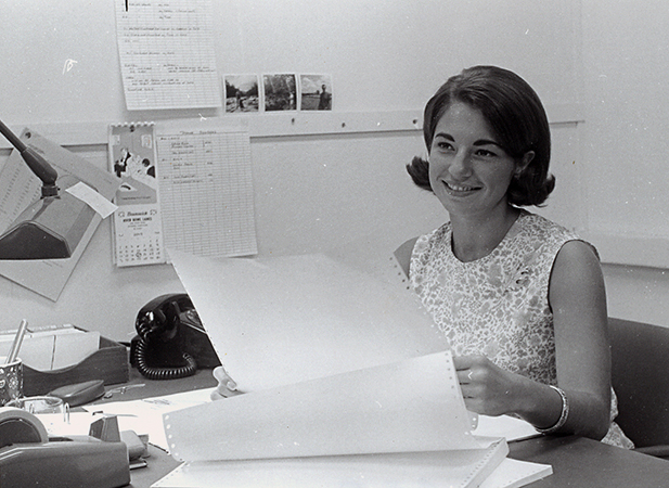 Suzanne Lee, St. Mary’s College, South Bend, Indiana, examines results of Polaris tests in PAE (1966)