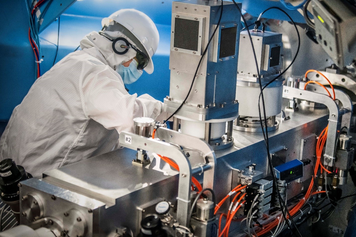 Amanda Davis shown working on one of the instruments designed under the APL-LLE collaboration