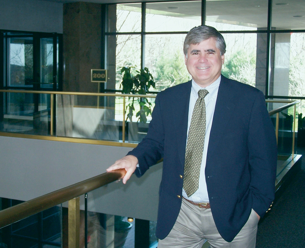 Tom Curtis is shown at the doors of APL's new field office near Fort Monmouth, N.J.