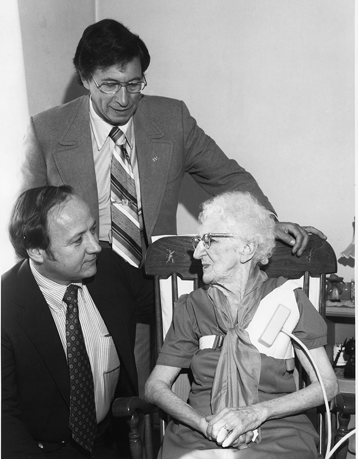 Dr. Kenneth B. Lewis, left, cardiologist, and Robert E. Fischell, physicist, develop the Johns Hopkins rechargeable pacemaker