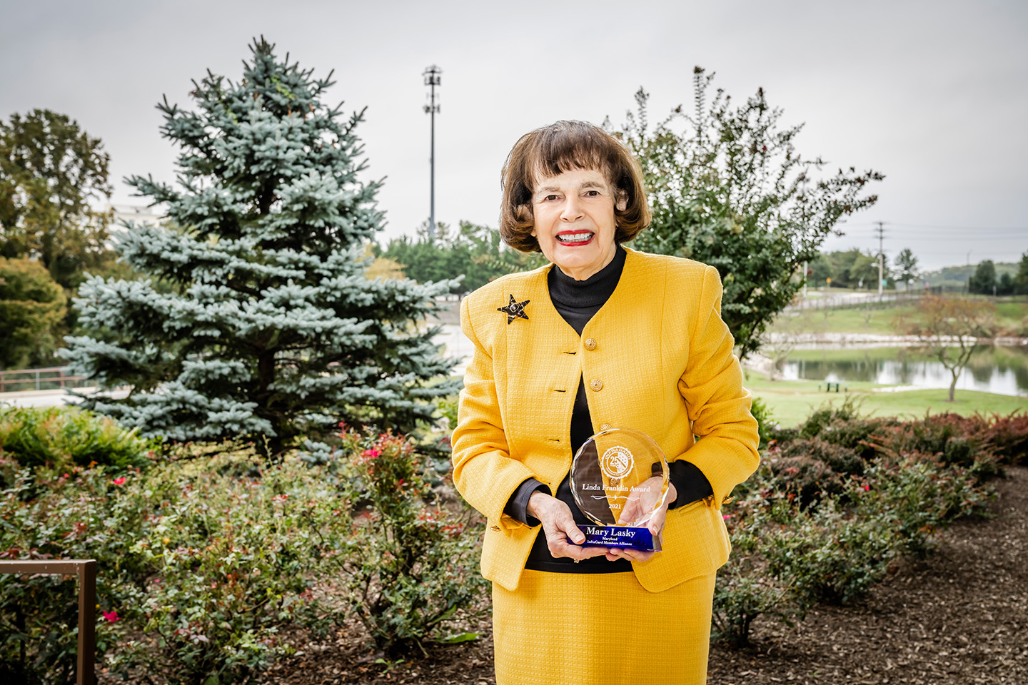 To commemorate Mary Lasky’s devotion and service to APL, a blue spruce tree was planted in her honor upon her retirement in 2012. The tree can be found next to the Lab’s Kossiakoff Center.  Credit: Johns Hopkins APL/Craig Weiman