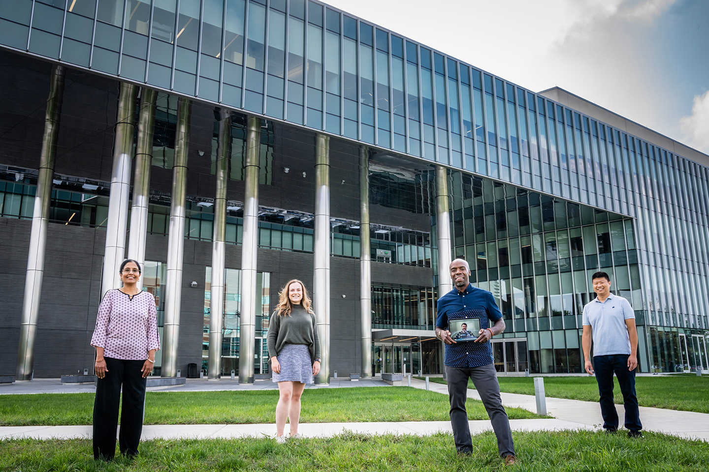 The Project Wonder team standing outside an APL building