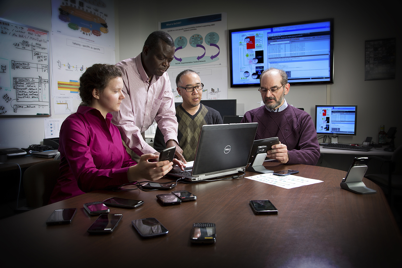 Engineers (from left) Esther Showalter, Akinwale Akinpelu, Warren Kim, and Tony DeSimone