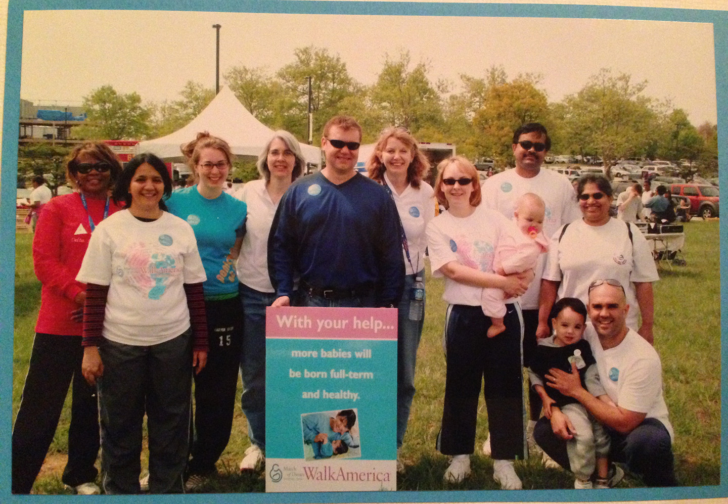 Kristine and Brent Harshaw hold Madison and brother Aidan at a 2005 APL March of Dimes event