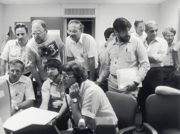 Members of the AMPTE team await news of the first ion release by the German Ion Release Module (IRM) flying on AMPTE