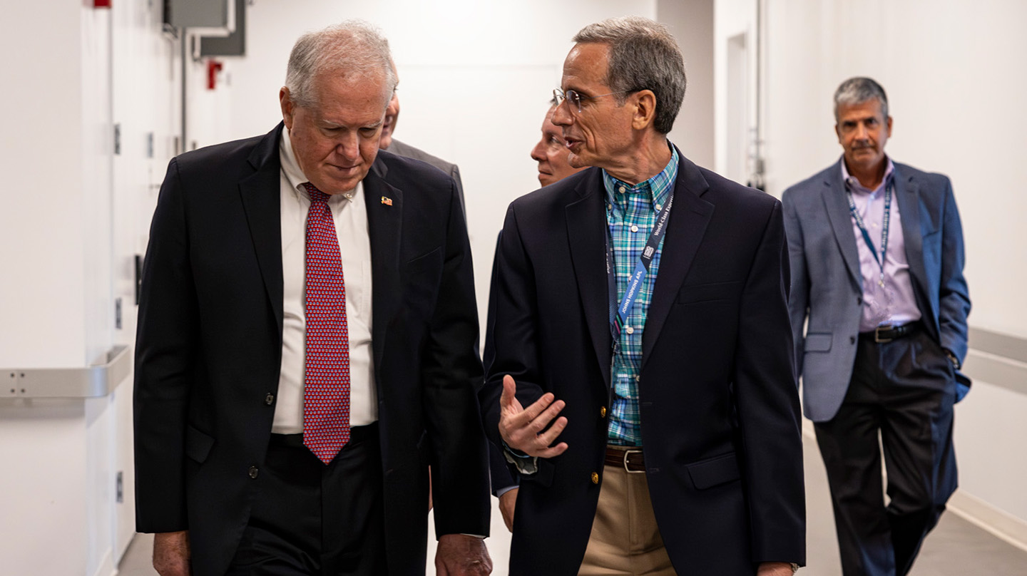 APL Director Ralph Semmel (right) leads Air Force Secretary Frank Kendall on a tour of APL’s campus in Laurel, Maryland, on Aug. 24.