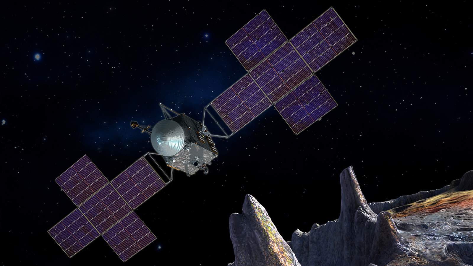 Artist’s illustration of the Psyche spacecraft over the surface of asteroid Psyche, a potentially metal-rich body that could be the remnants of a primitive planetary core.  Credit: NASA/JPL-Caltech/Arizona State University/Space Systems Loral/Peter Rubin