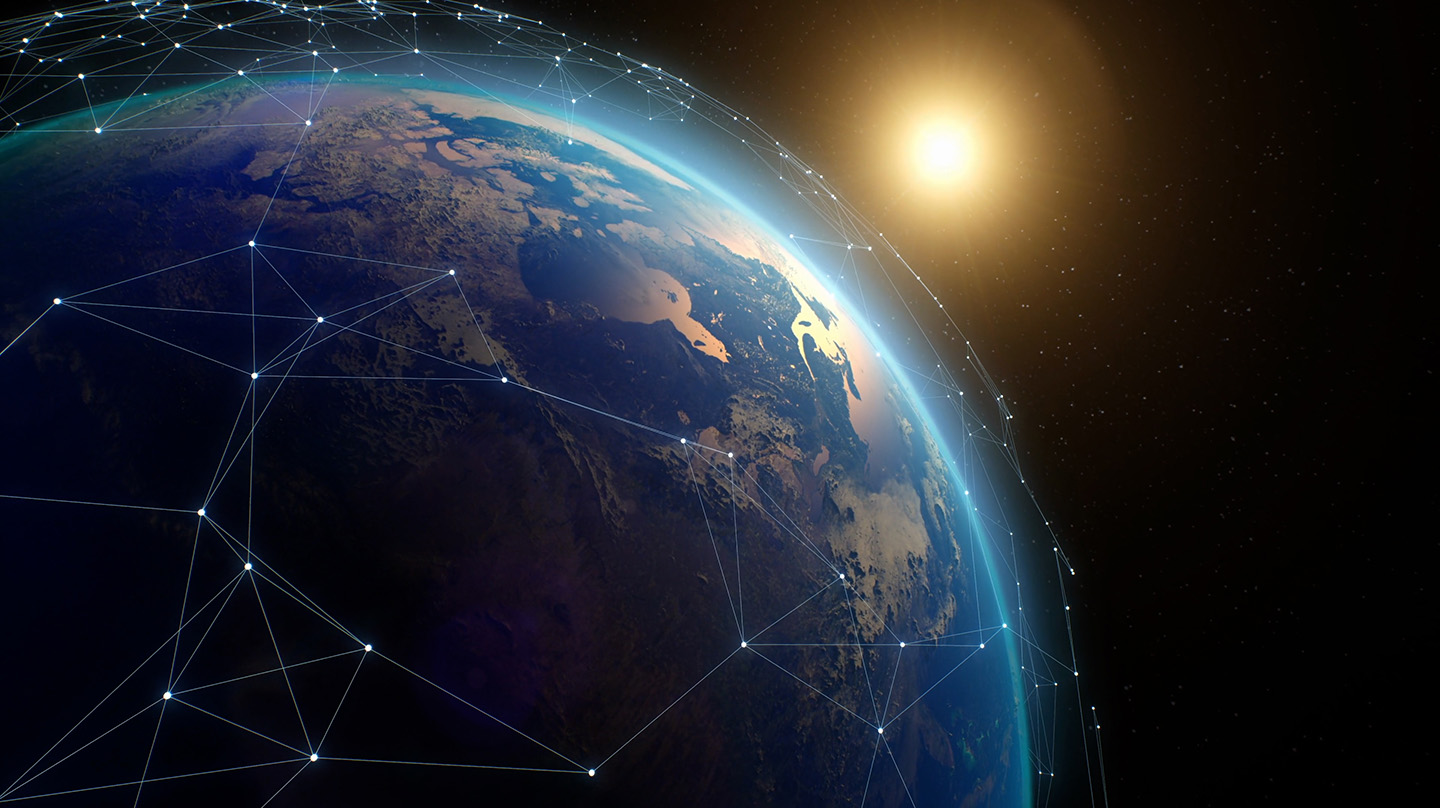 A network intersects and covers the planet Earth as it orbits the Sun